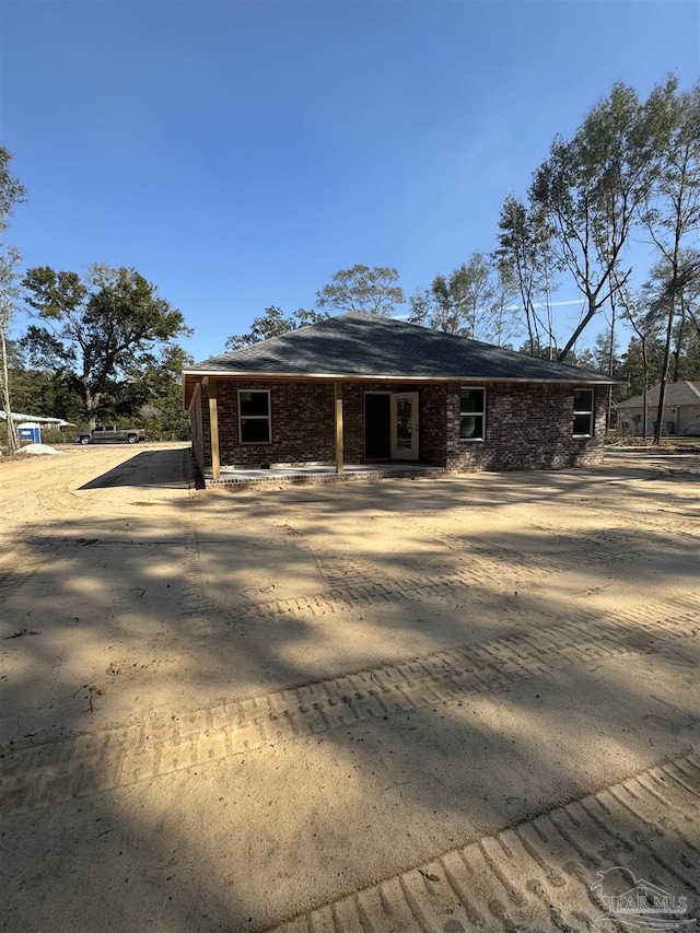 view of front of property with brick siding