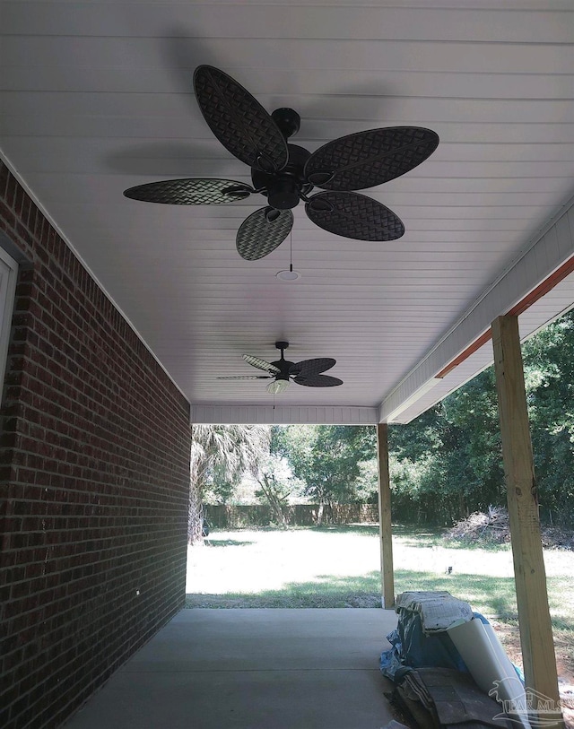 view of patio with area for grilling and ceiling fan