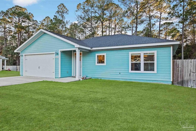 ranch-style home with an attached garage, driveway, fence, and a front yard