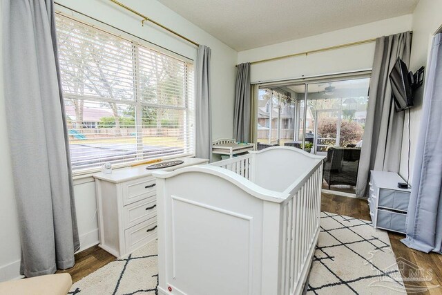 kitchen featuring white cabinetry, light countertops, and light wood finished floors