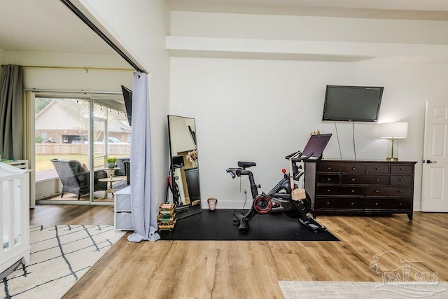 workout area featuring wood finished floors