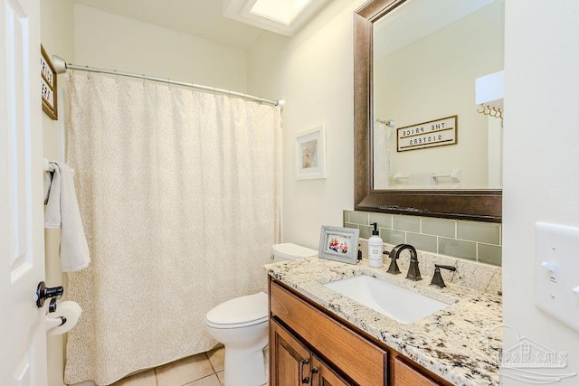 bathroom featuring tile patterned floors, toilet, curtained shower, decorative backsplash, and vanity