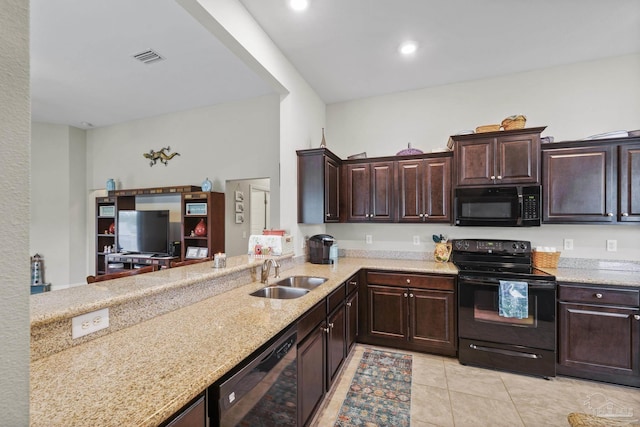 5798 Vendome Ct, Milton, FL 32583 - kitchen with light tile patterned floors, a sink, light stone counters, dark brown cabinetry, and black appliances