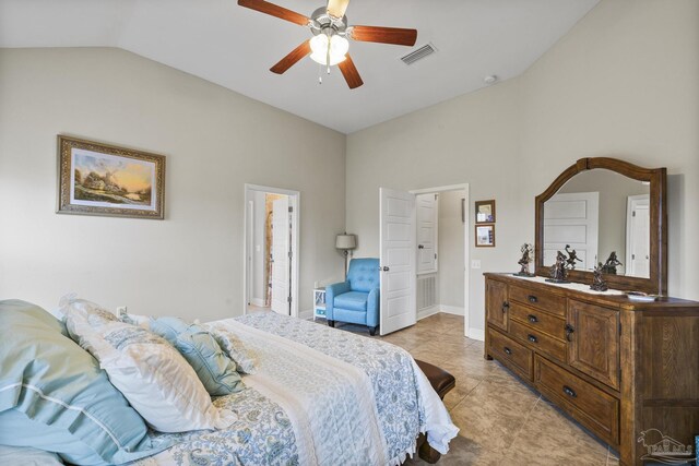 5798 Vendome Ct, Milton, FL 32583 - bedroom with light tile patterned flooring, high vaulted ceiling, a ceiling fan, baseboards, and visible vents