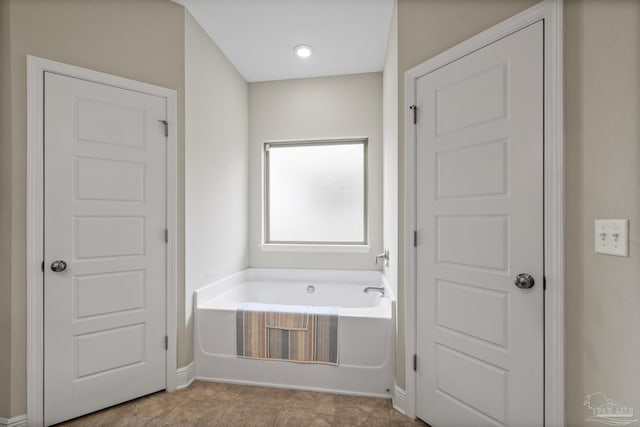5798 Vendome Ct, Milton, FL 32583 - full bathroom with tile patterned floors and a bath