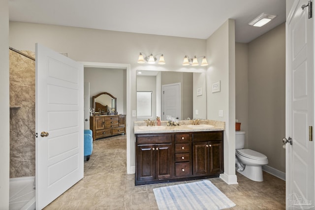 5798 Vendome Ct, Milton, FL 32583 - full bathroom with baseboards, double vanity, a sink, and toilet