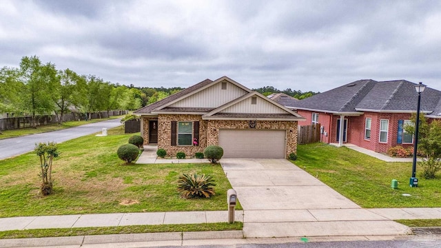 5798 Vendome Ct, Milton, FL 32583 - view of front facade with brick siding, a front yard, driveway, and fence