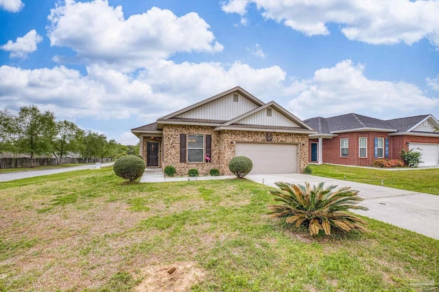 5798 Vendome Ct, Milton, FL 32583 - view of front of house with brick siding, driveway, a garage, and a front lawn