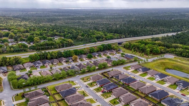 5798 Vendome Ct, Milton, FL 32583 - birds eye view of property with a wooded view and a residential view