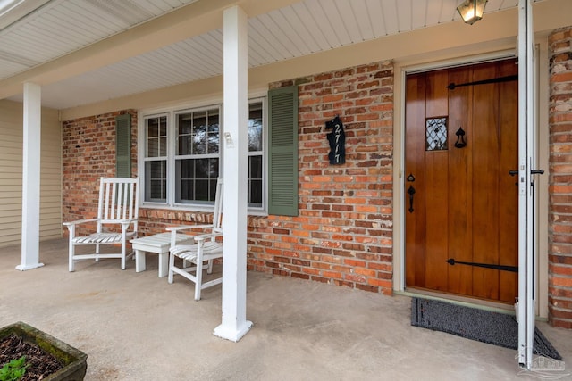 property entrance with a porch