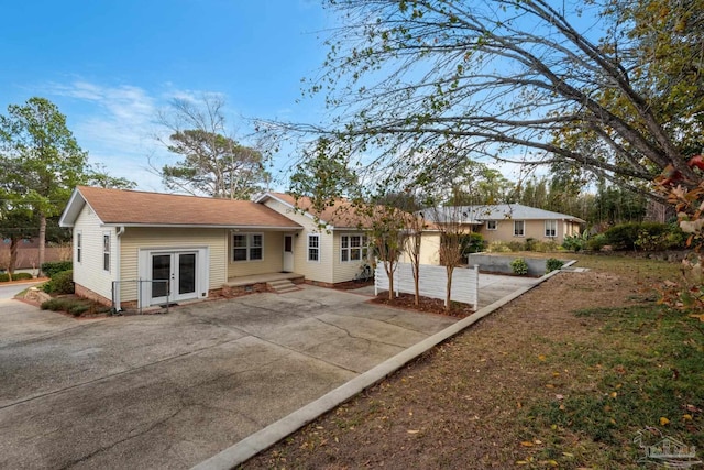 back of property featuring french doors