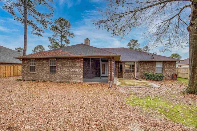 back of property featuring a patio