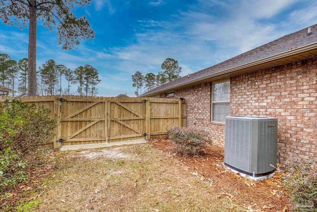 view of yard featuring central AC