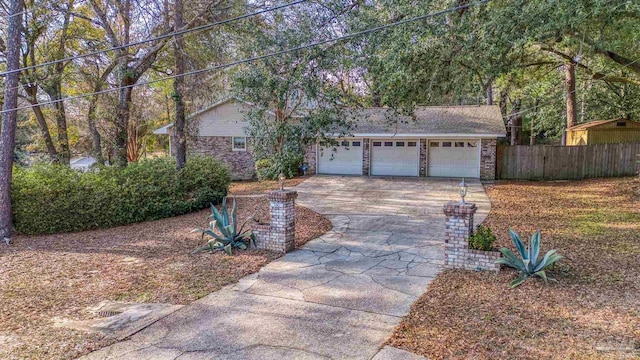 view of front of property featuring a garage