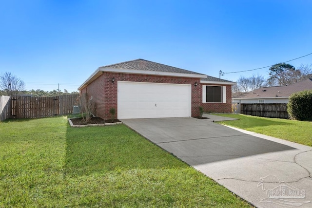 view of side of home featuring driveway, a yard, and brick siding