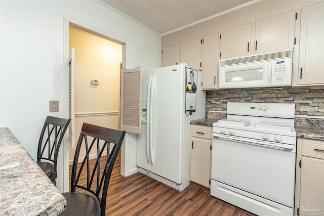 kitchen featuring decorative backsplash, white appliances, white cabinetry, and ornamental molding