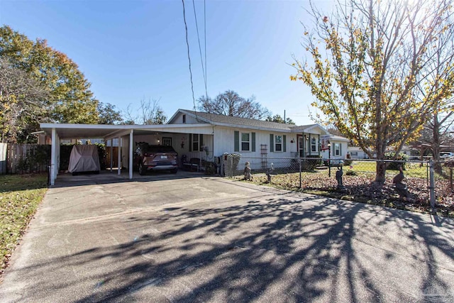 single story home featuring a carport