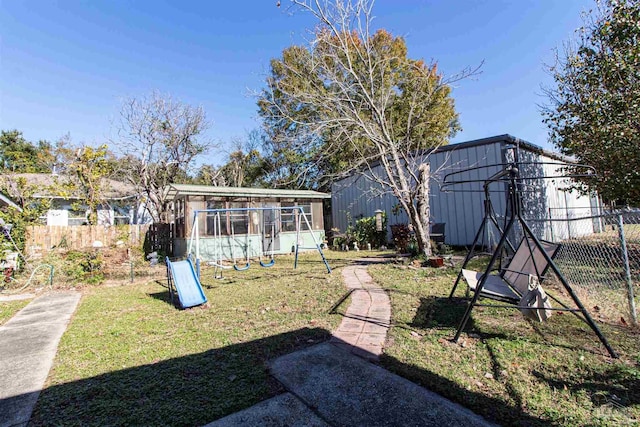 view of yard with a playground