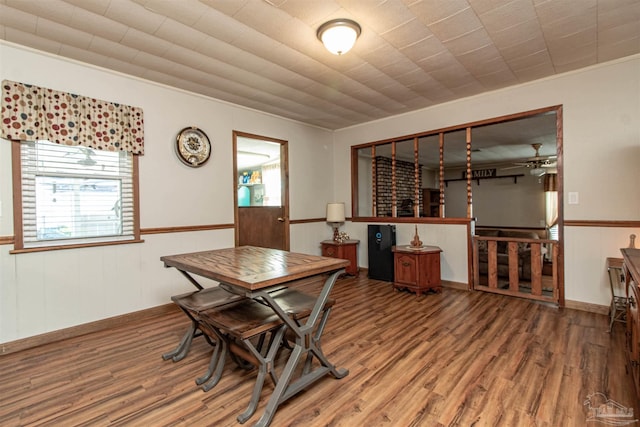 dining room with hardwood / wood-style flooring and ceiling fan