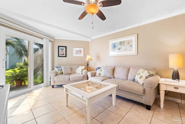 living room featuring ceiling fan, crown molding, a textured ceiling, and light tile patterned floors