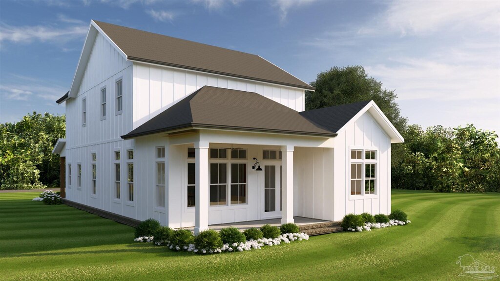 exterior space with a front yard and board and batten siding