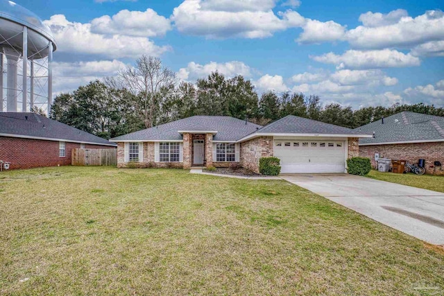 ranch-style home with brick siding, a shingled roof, a garage, driveway, and a front lawn