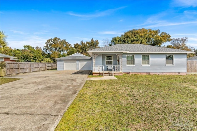 ranch-style house with an outbuilding, a garage, a front lawn, and a porch