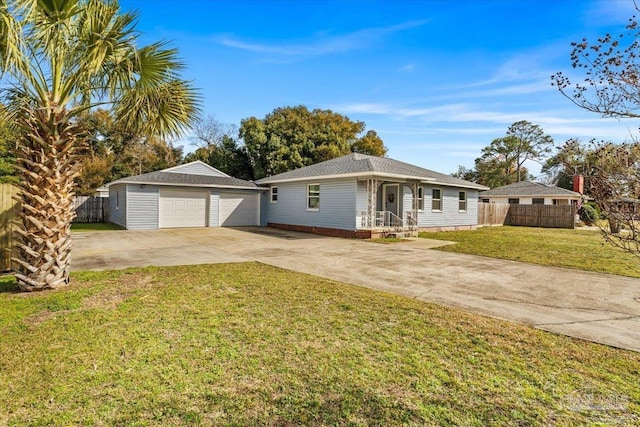 single story home with a garage, an outdoor structure, and a front yard