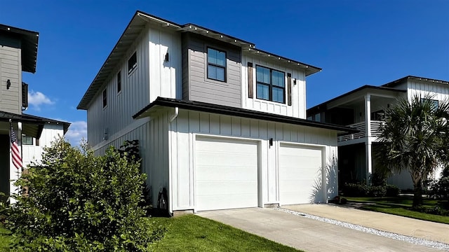 view of front of property with a balcony and a garage