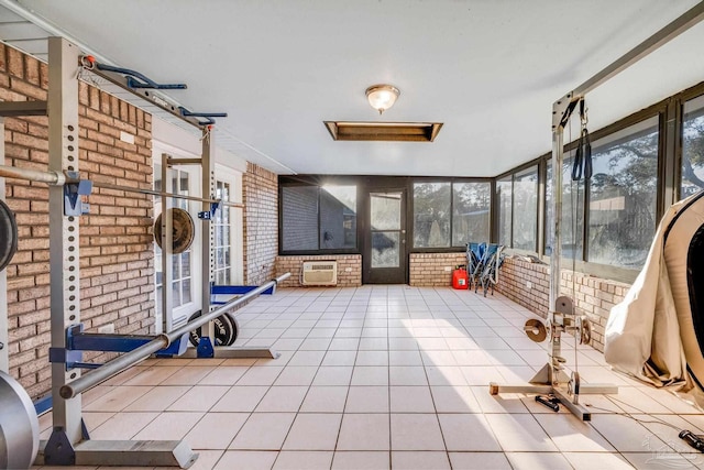2000 Silverado Rd, Pensacola, FL 32506 - unfurnished sunroom with plenty of natural light and a wall unit AC