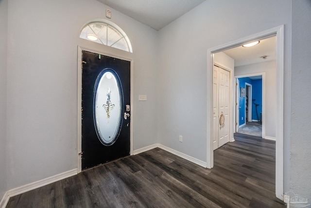 2000 Silverado Rd, Pensacola, FL 32506 - foyer entrance with dark wood finished floors and baseboards