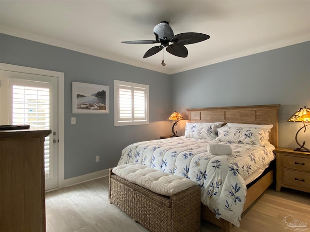 bedroom with ceiling fan, ornamental molding, and light hardwood / wood-style flooring