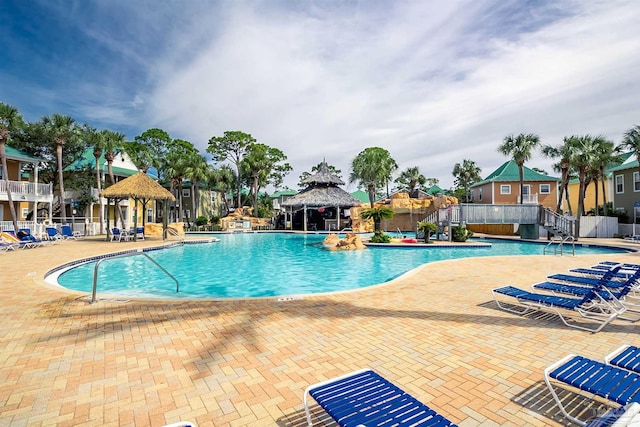 view of swimming pool featuring a gazebo and a patio area