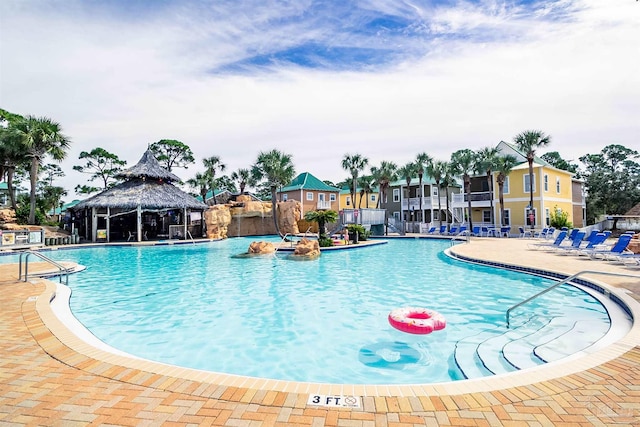 view of pool featuring a gazebo and a patio