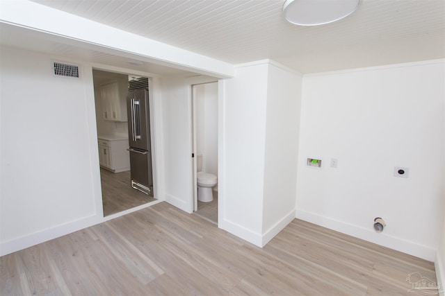 laundry room with light wood-type flooring and electric dryer hookup