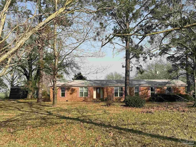 ranch-style home with crawl space and a front yard