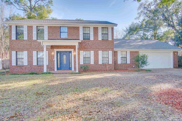 colonial-style house with a garage