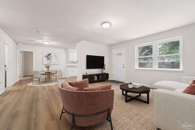 living room featuring light hardwood / wood-style floors