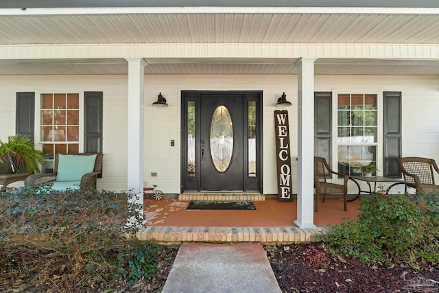 property entrance with a porch