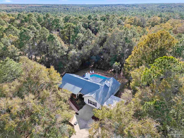 aerial view featuring a forest view