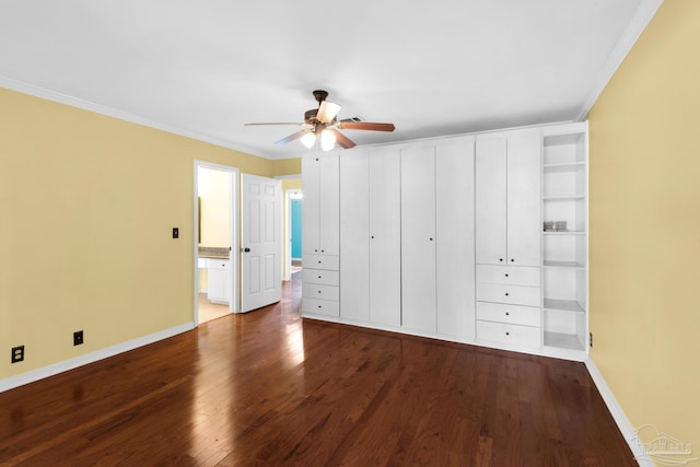 unfurnished bedroom featuring ceiling fan, crown molding, and wood-type flooring