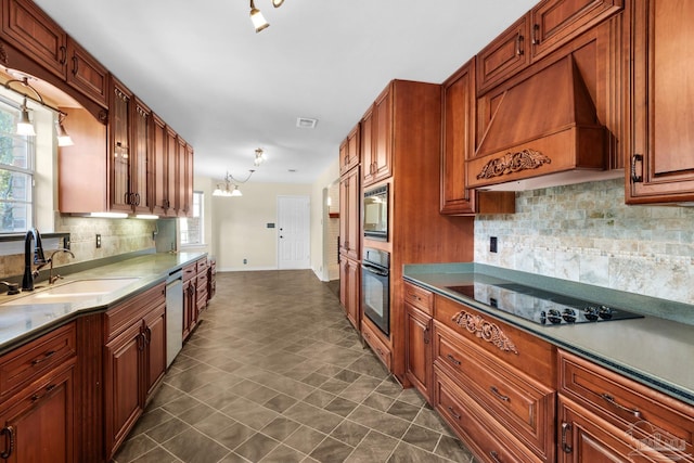 kitchen with premium range hood, a chandelier, tasteful backsplash, and black appliances