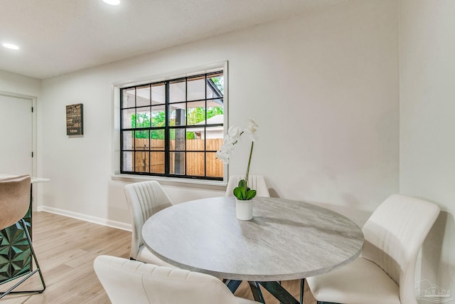 dining space featuring light hardwood / wood-style flooring