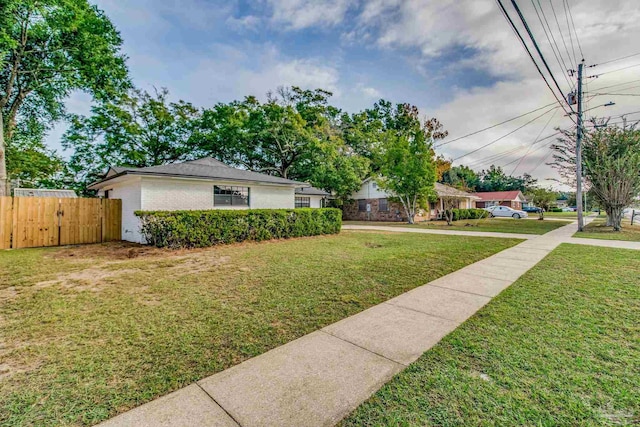 view of front of home with a front lawn