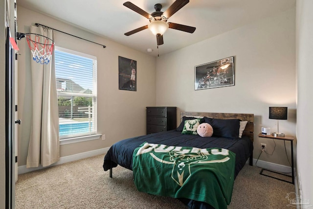 carpeted bedroom with ceiling fan