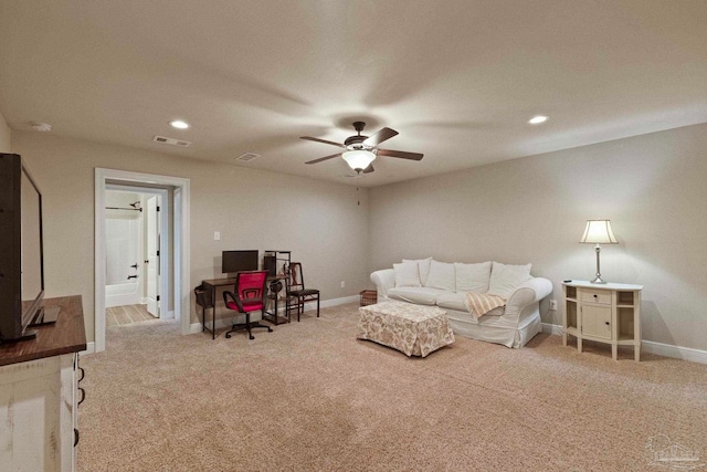 living room with carpet floors and ceiling fan