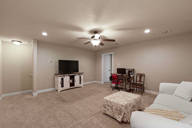 living room with light carpet and ceiling fan