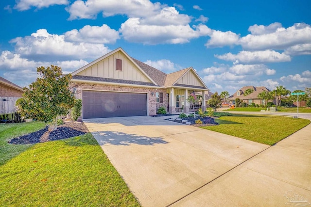 craftsman house featuring a front lawn and a garage