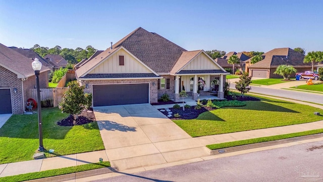 craftsman-style house with a front yard and covered porch