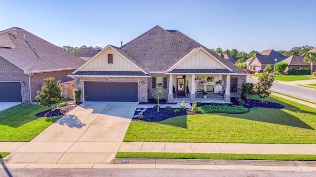 craftsman-style house featuring a front lawn and a garage